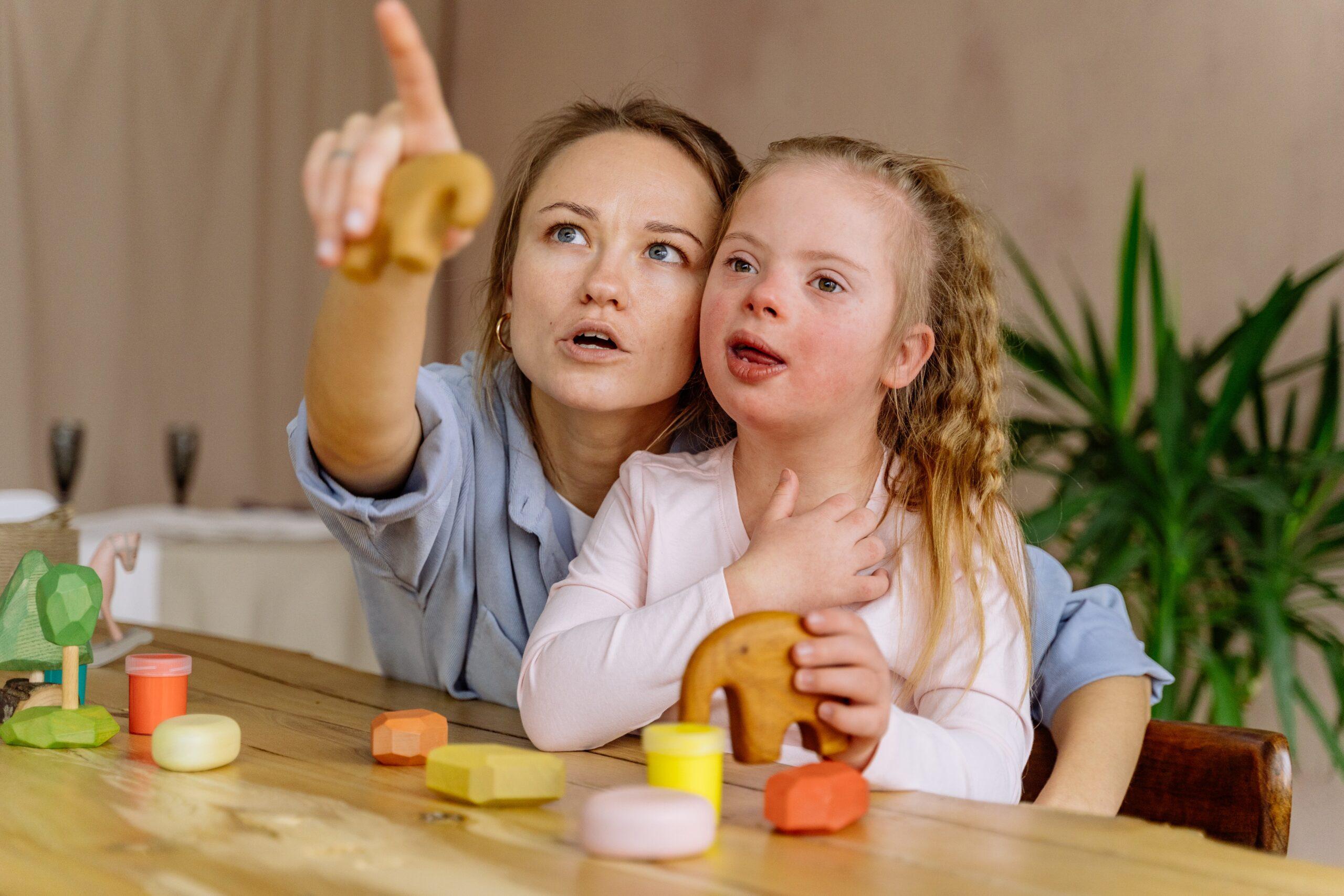 teacher with a child with down syndrome